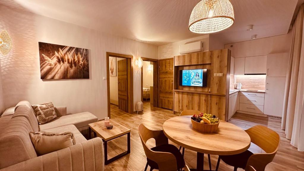 Posezení v ubytování Łeba Park Resort - Domki