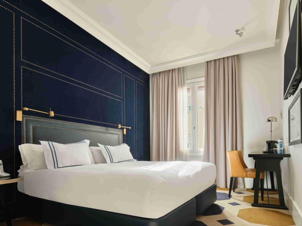 Postel nebo postele na pokoji v ubytování Only YOU Boutique Hotel Madrid
