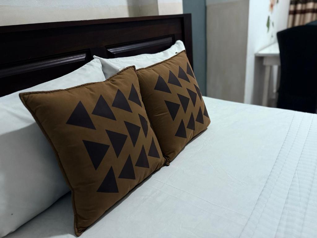 Postel nebo postele na pokoji v ubytování Home Living Unit