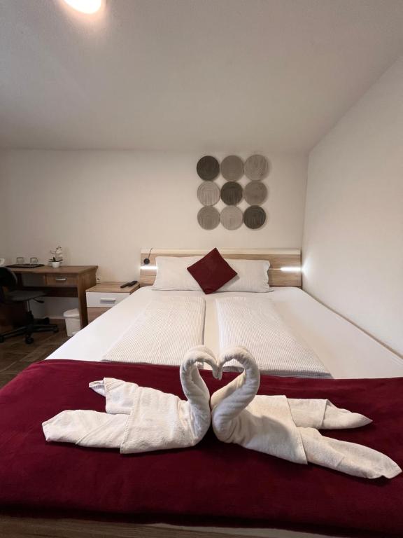 Postel nebo postele na pokoji v ubytování Panda Rooms
