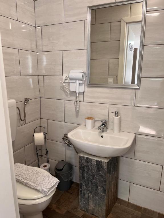 Koupelna v ubytování Panda Rooms