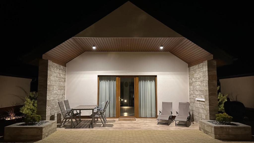 Patio nebo venkovní prostory v ubytování Łeba Park Resort - Domki