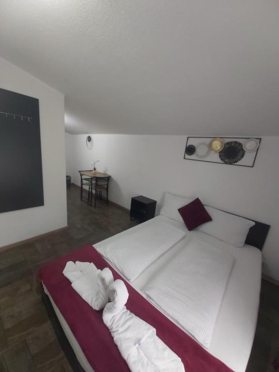 Postel nebo postele na pokoji v ubytování Panda Rooms