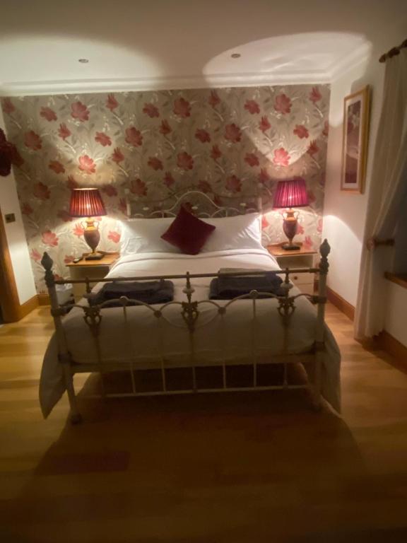 Postel nebo postele na pokoji v ubytování Bayview Guest House