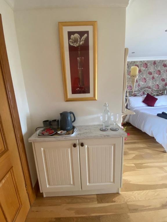 Postel nebo postele na pokoji v ubytování Bayview Guest House
