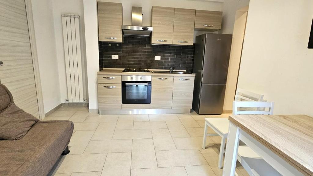 Η κουζίνα ή μικρή κουζίνα στο Pretty Home Fiumicino