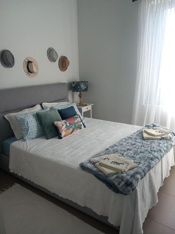 Postel nebo postele na pokoji v ubytování La Casa Del Sol Villa Aegina