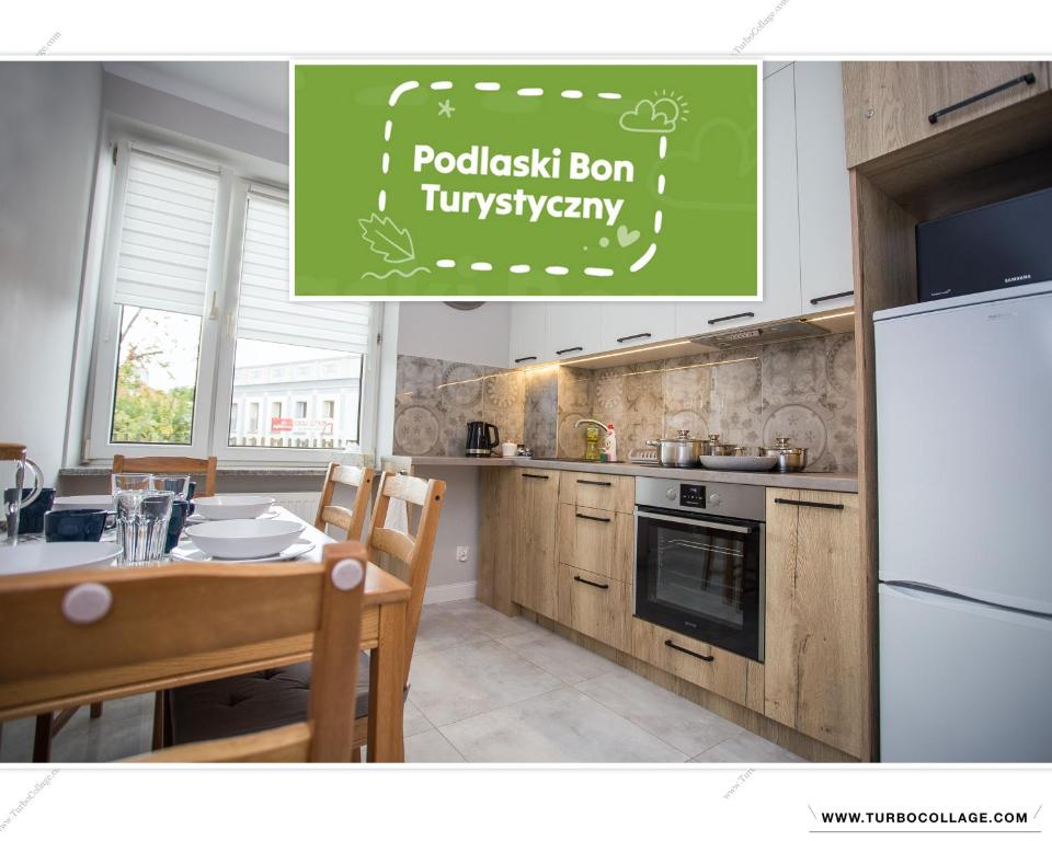 Kuchyňa alebo kuchynka v ubytovaní CR Apartament przy Rynku Sienkiewicza 6
