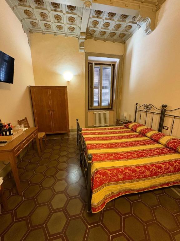 Postel nebo postele na pokoji v ubytování Agriturismo Montecorona