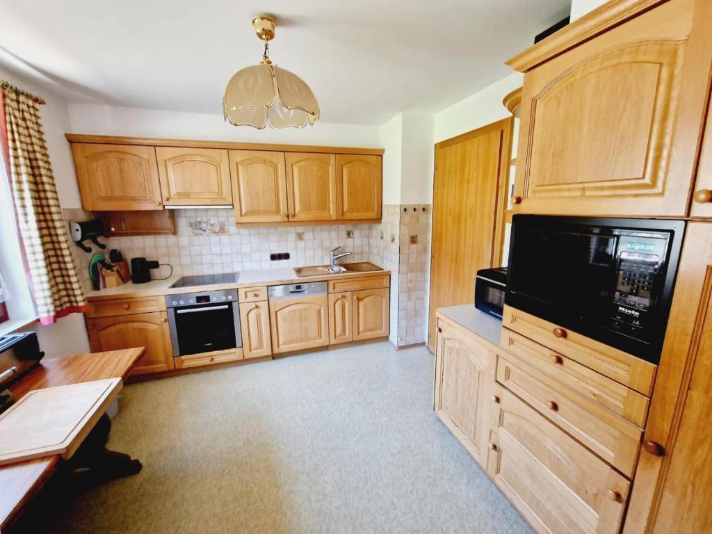Kuchyň nebo kuchyňský kout v ubytování Haus Rätikon
