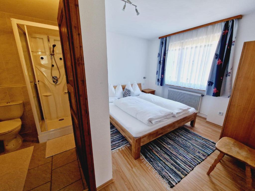 Postel nebo postele na pokoji v ubytování Haus Rätikon