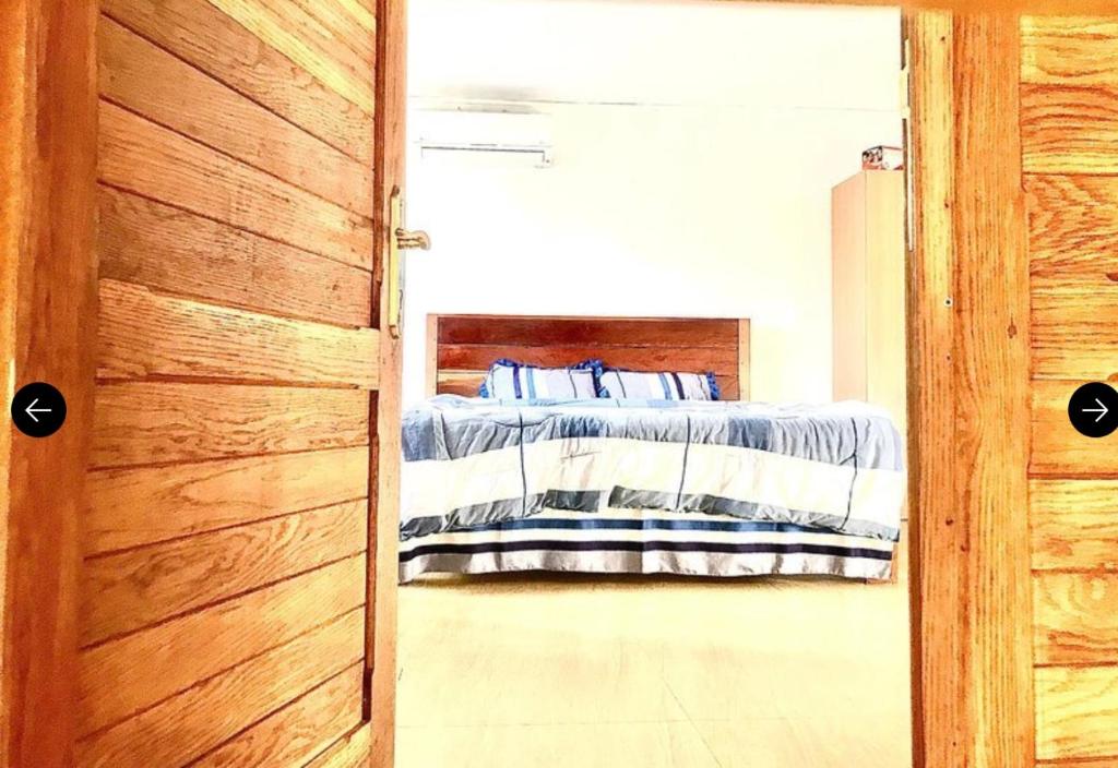 Postel nebo postele na pokoji v ubytování Fortune Villas