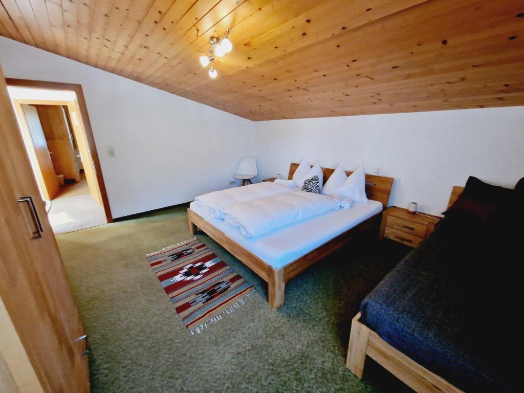 Postel nebo postele na pokoji v ubytování Haus Rätikon