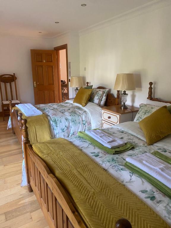 Postel nebo postele na pokoji v ubytování Bayview Guest House