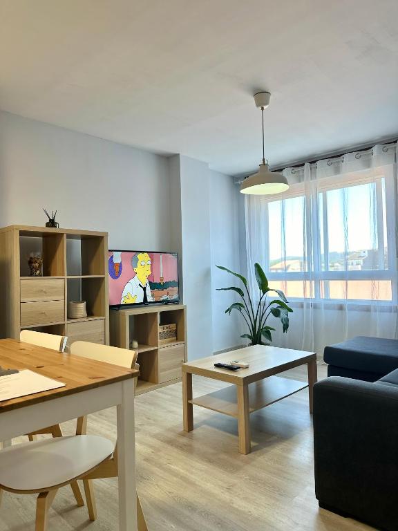 A television and/or entertainment centre at Lemos Nube
