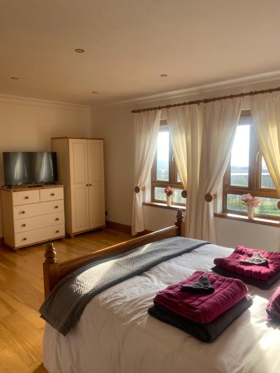 Postel nebo postele na pokoji v ubytování Bayview Guest House