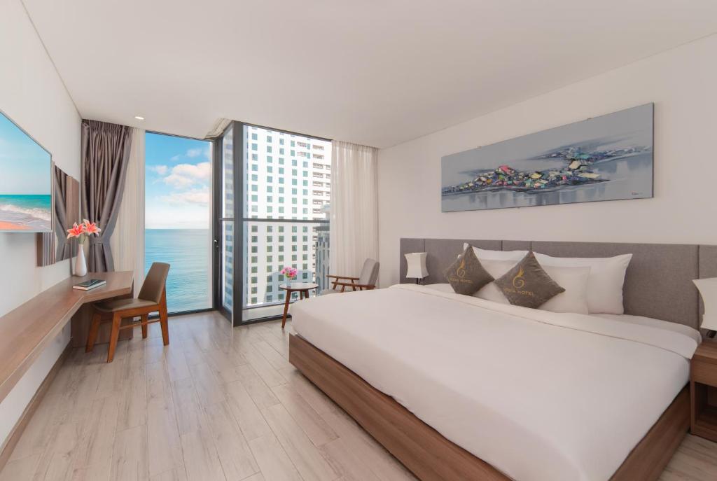 Giường trong phòng chung tại Gosia Hotel