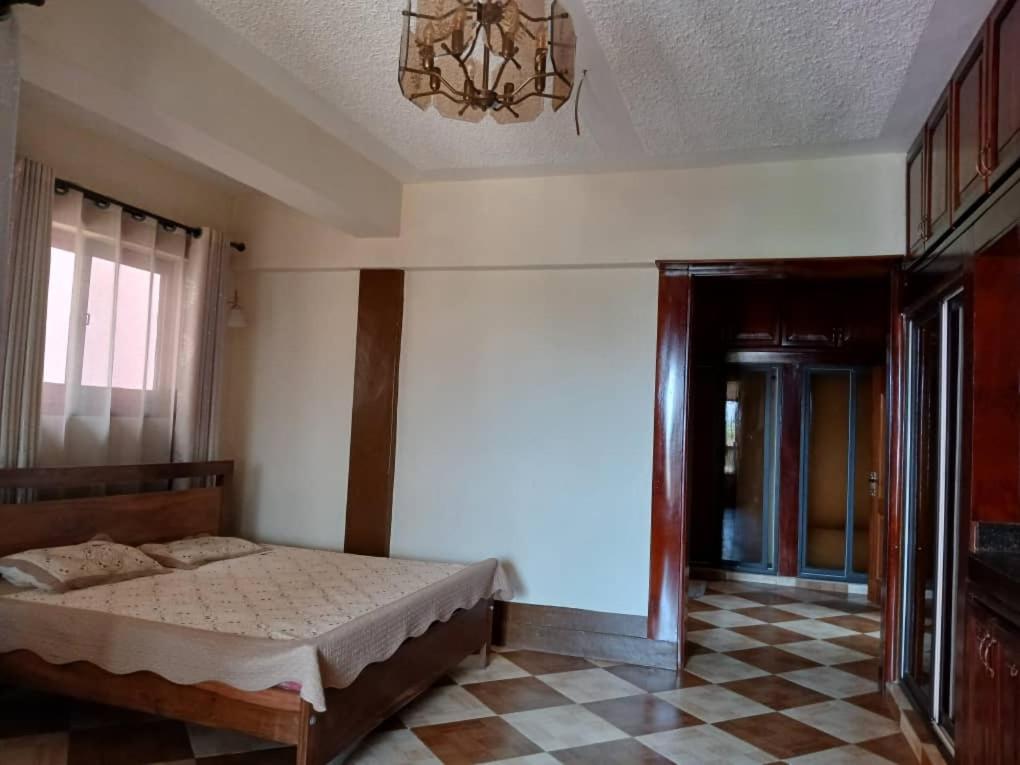 Postel nebo postele na pokoji v ubytování Hotel Acacia View