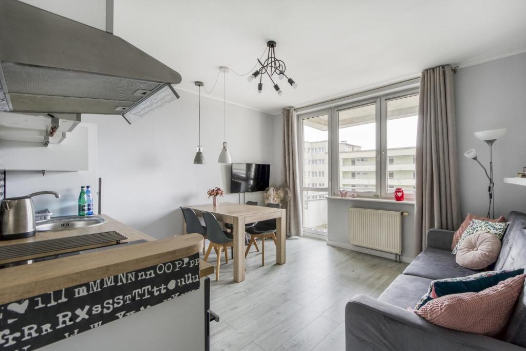 Kuchyňa alebo kuchynka v ubytovaní Gama Home Kondratowicza18