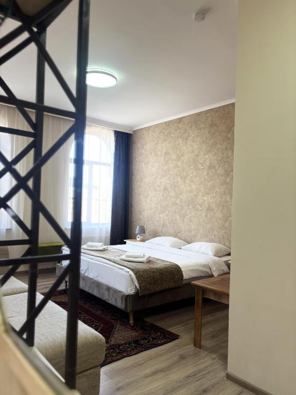 Postel nebo postele na pokoji v ubytování 21 Rooms Hotel