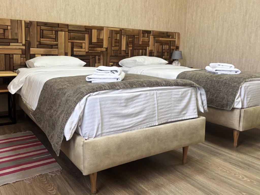 Postel nebo postele na pokoji v ubytování 21 Rooms Hotel