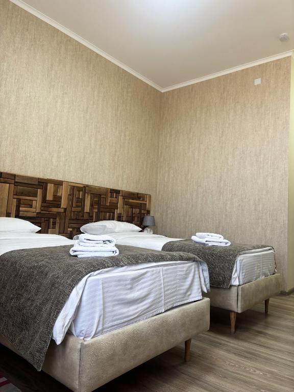 Postel nebo postele na pokoji v ubytování 21 Rooms Hotel