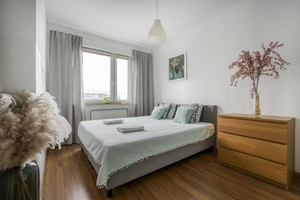 Ένα ή περισσότερα κρεβάτια σε δωμάτιο στο Gama Home Wyspowa 1