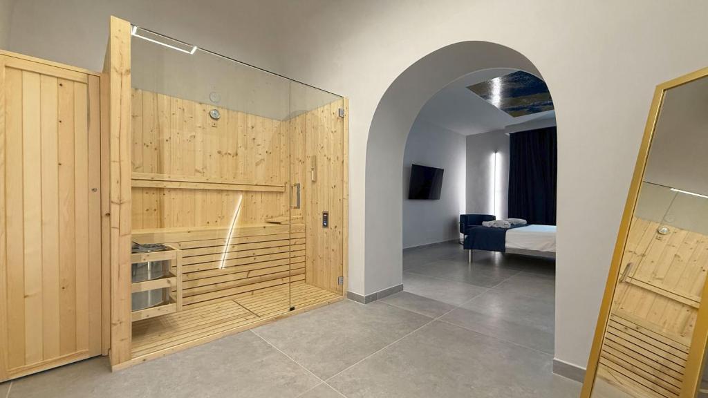 Postel nebo postele na pokoji v ubytování Shanti Rooms & Apartments Lucullo
