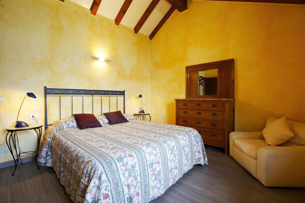 A bed or beds in a room at Rustico alla Spiaggia