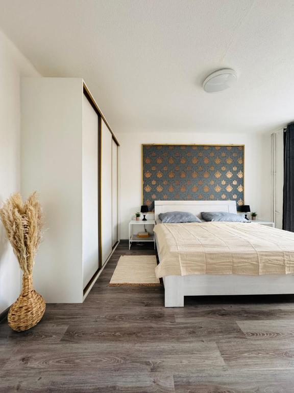 Posteľ alebo postele v izbe v ubytovaní Apartment YuPa
