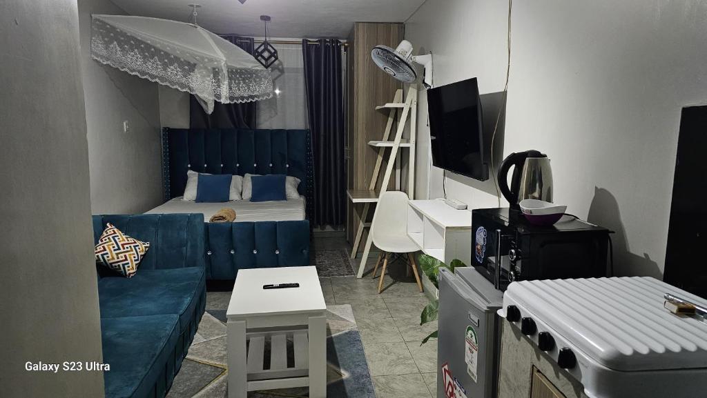 Ένα ή περισσότερα κρεβάτια σε δωμάτιο στο Mayfair homes