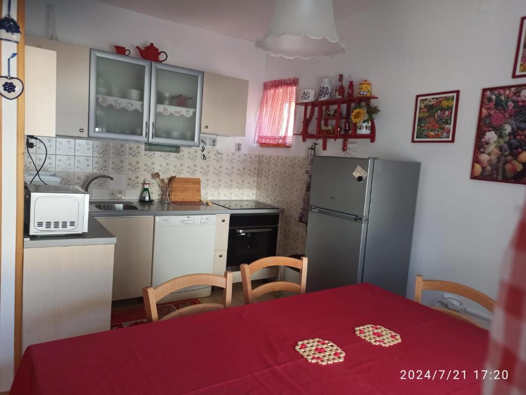 Kuchyň nebo kuchyňský kout v ubytování Apartment Ljerka