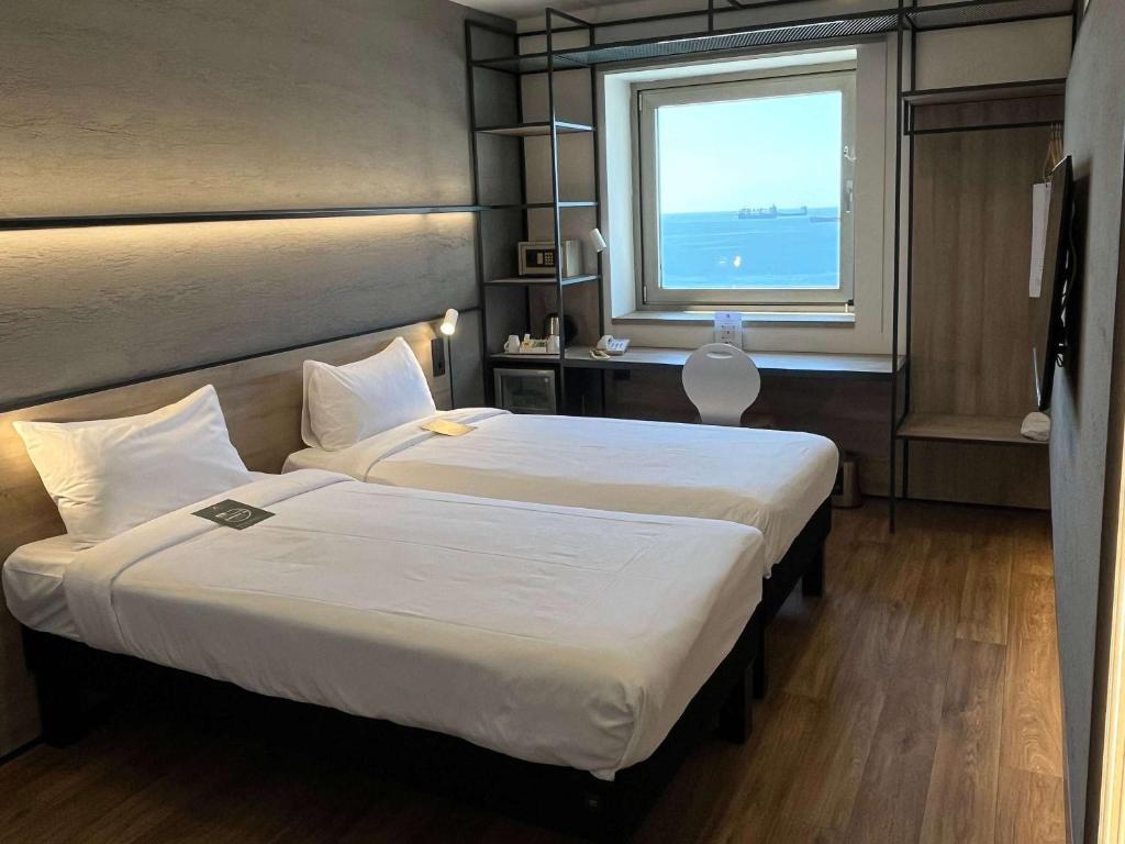 Cama ou camas em um quarto em Ibis Istanbul Zeytinburnu