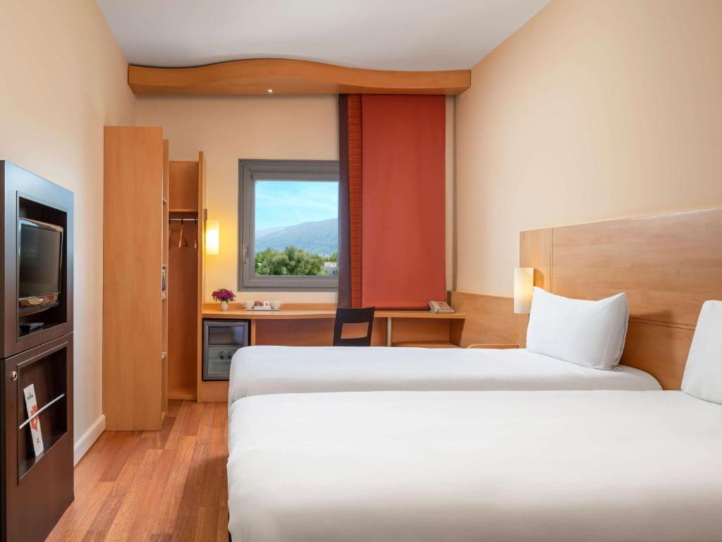 Cama ou camas em um quarto em Ibis Bursa