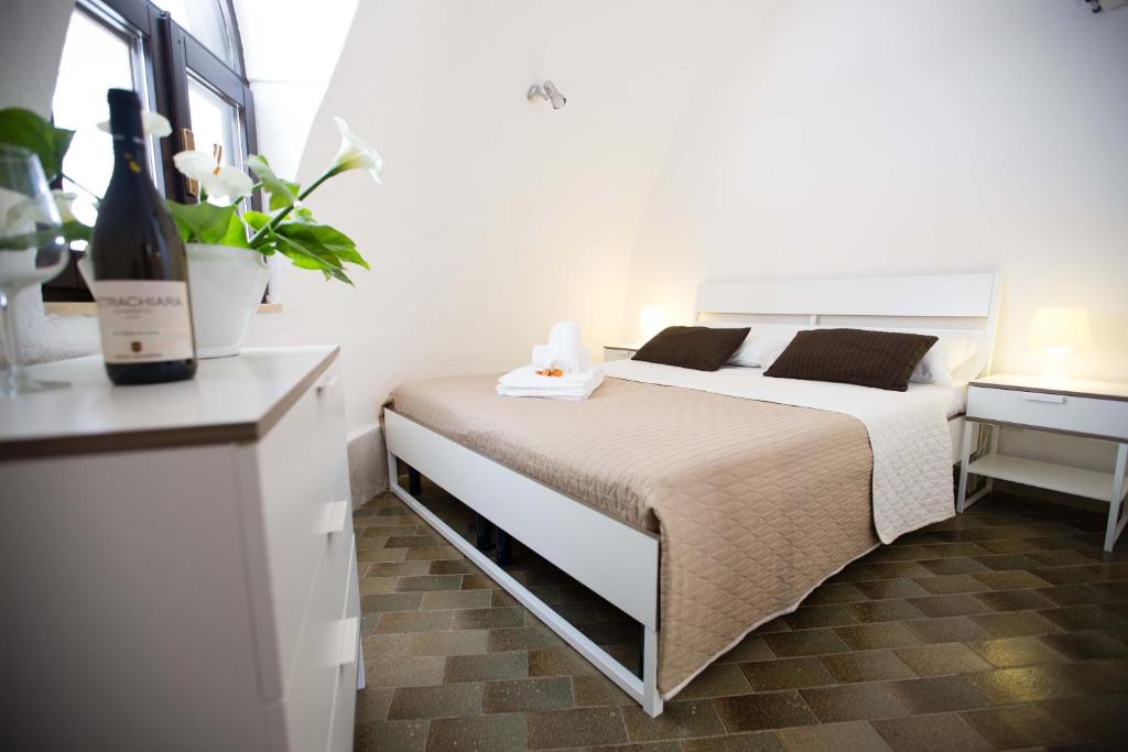 Posteľ alebo postele v izbe v ubytovaní Residence Guidaloca