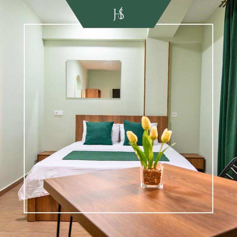 Postel nebo postele na pokoji v ubytování Hotel Serenity