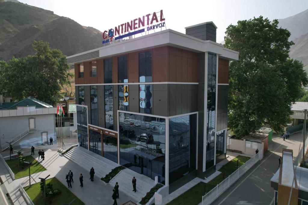 a rendering of a building with people walking outside at CONTINENTAL DARVOZ Hotel in Dashtak