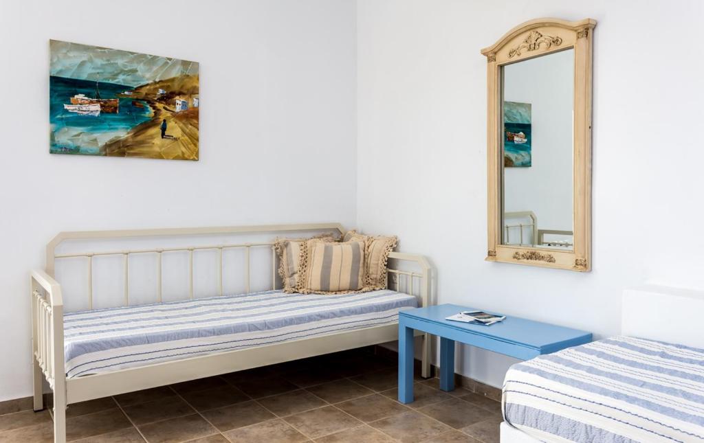 Postel nebo postele na pokoji v ubytování Althea Studios
