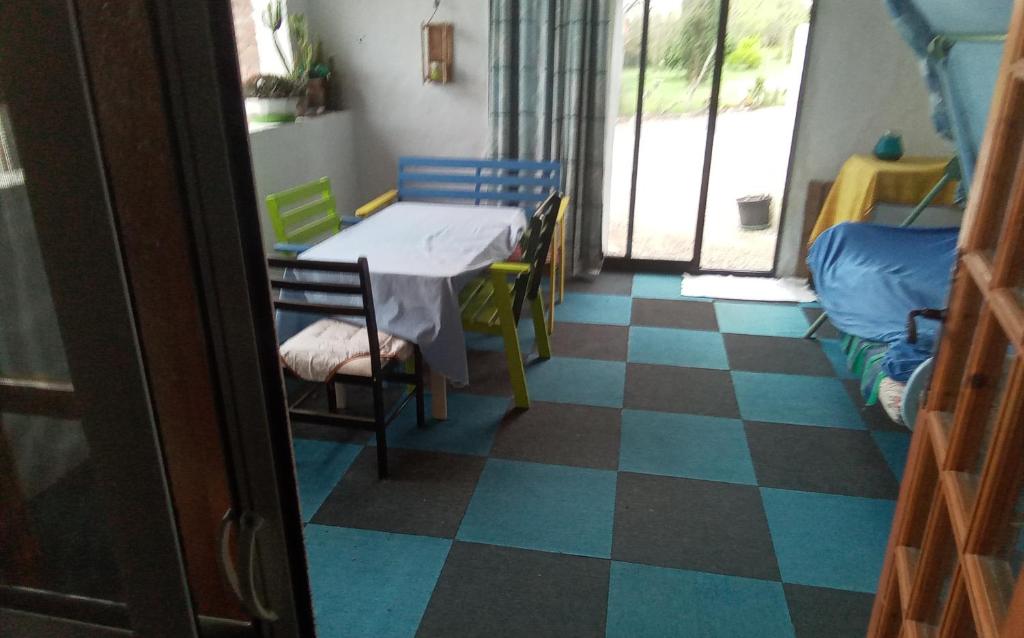 Postel nebo postele na pokoji v ubytování le canard fou