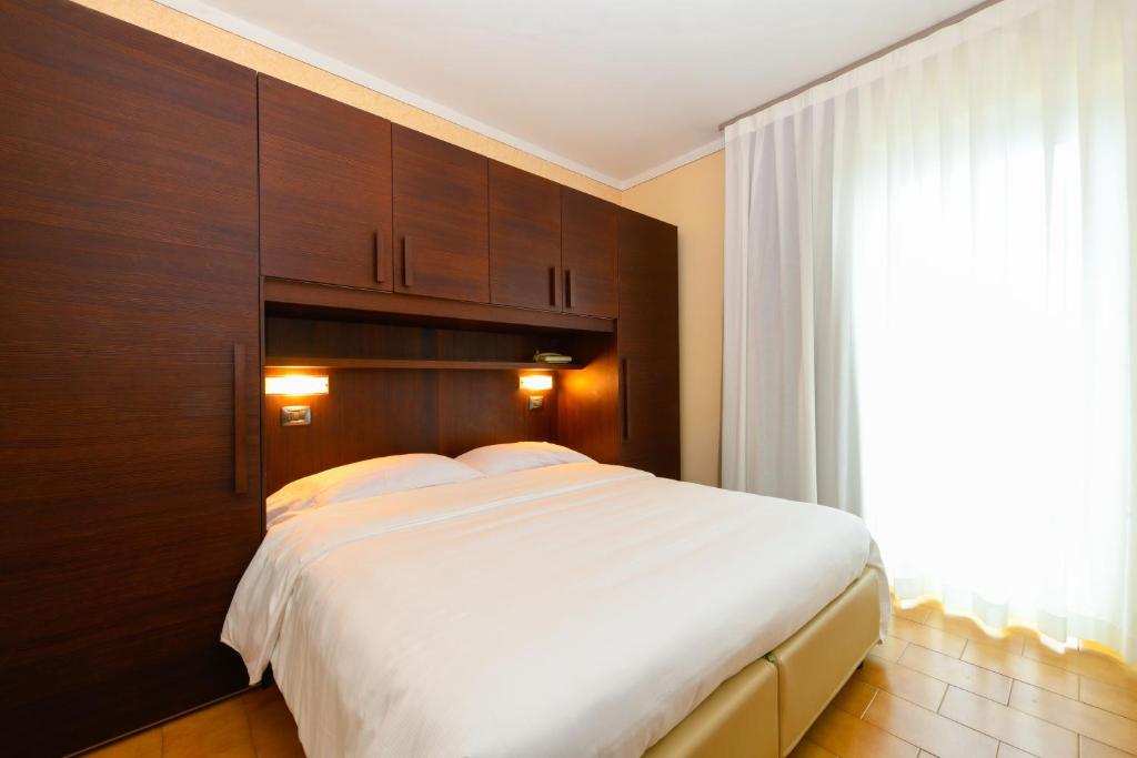 Postel nebo postele na pokoji v ubytování Hotel Bellavista