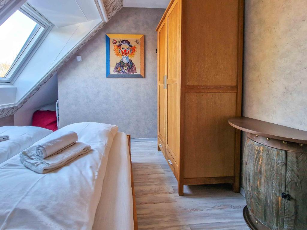 Postel nebo postele na pokoji v ubytování Strandmuschel