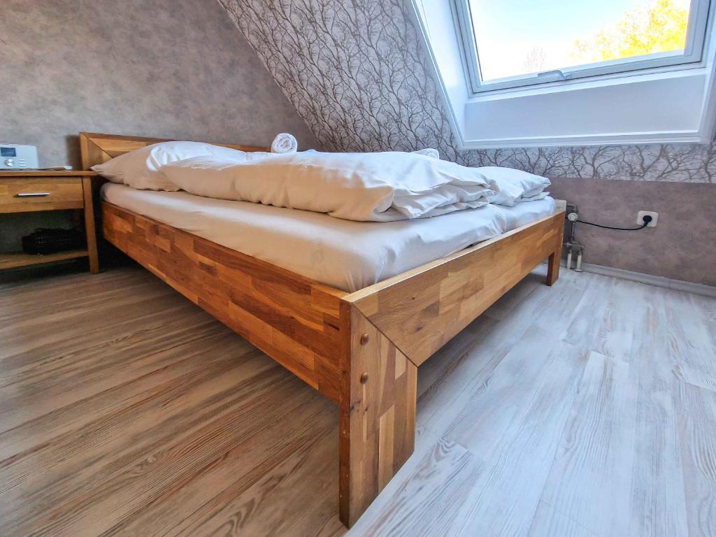 Postel nebo postele na pokoji v ubytování Strandmuschel