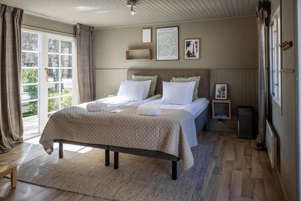 Postel nebo postele na pokoji v ubytování Naya Retreat & Hotell