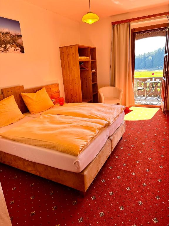 Postel nebo postele na pokoji v ubytování Landhotel Gasthof Eichhof Natters