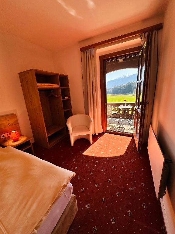 Postel nebo postele na pokoji v ubytování Landhotel Gasthof Eichhof Natters