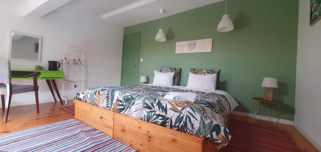 Postel nebo postele na pokoji v ubytování A-Típica GuestHouse