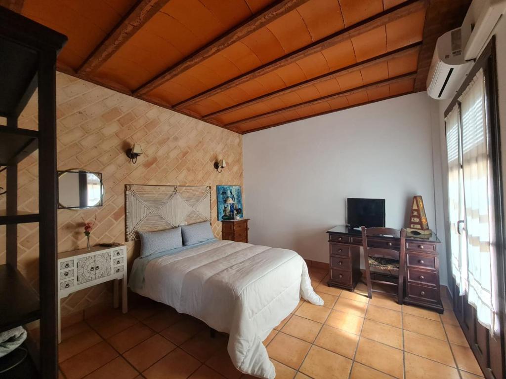 Postel nebo postele na pokoji v ubytování La Moreneta