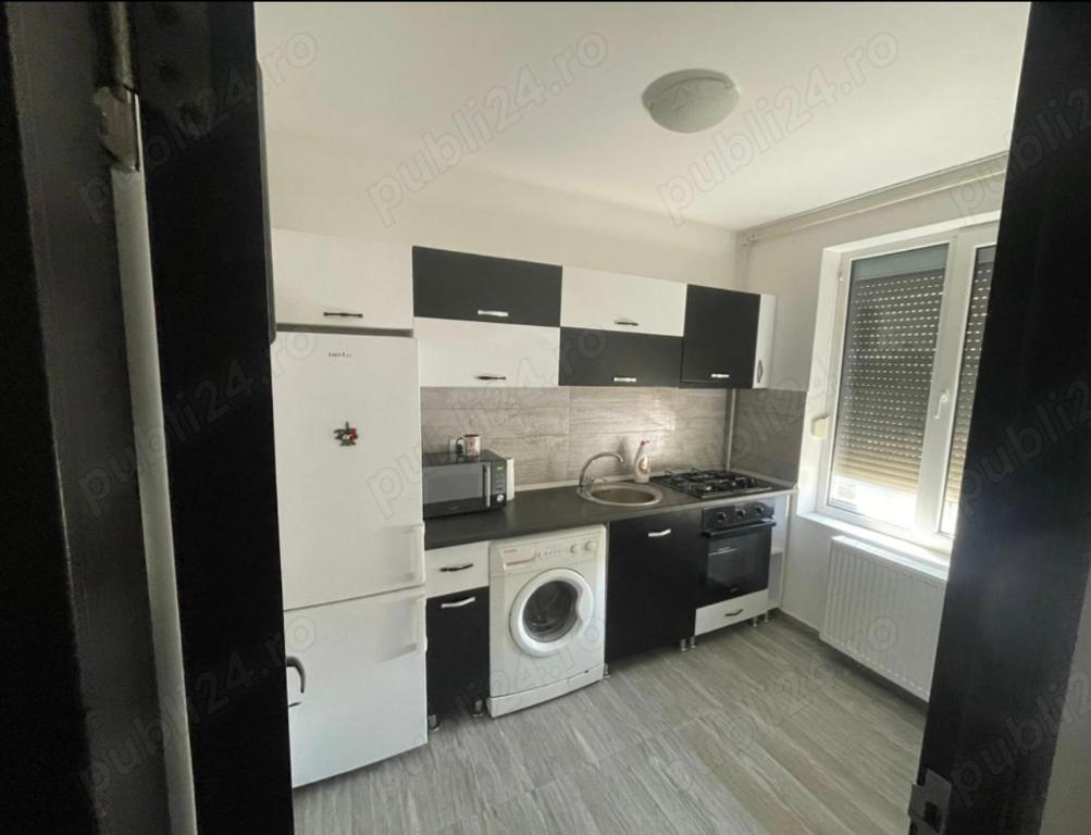 Η κουζίνα ή μικρή κουζίνα στο Apartament Yuk