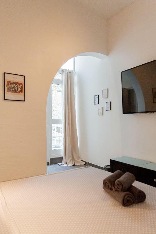 TV a/nebo společenská místnost v ubytování Aime's House