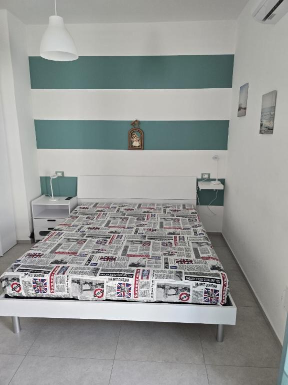 A bed or beds in a room at Scrusciu Do Mari